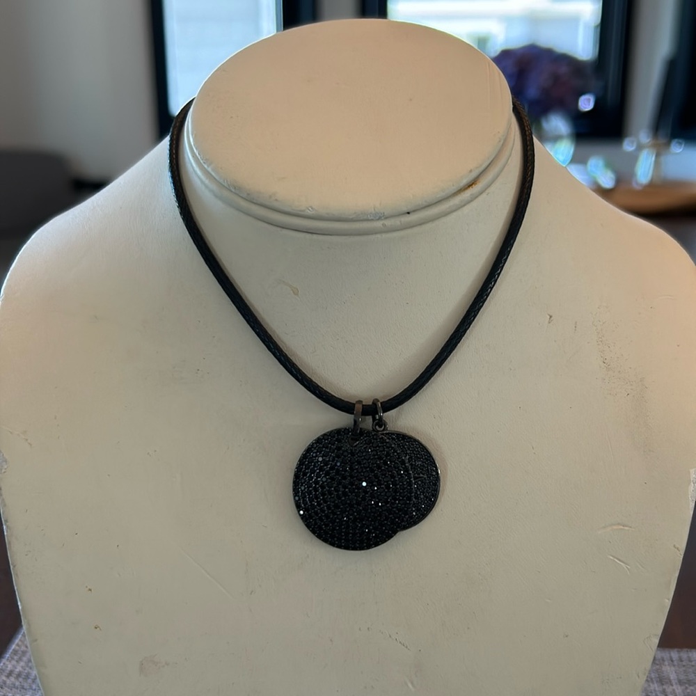 Leather cord choker with two charms- charms can be worn separately or together.